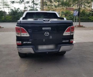 Mazda BT 50 2014 - Cần bán lại xe Mazda BT 50 3.2L AT đời 2014, màu đen số tự động, giá tốt