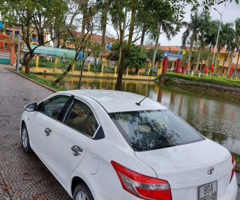 Toyota Vios 2014 - Gia đình cần bán Toyota Vios sản xuất 2014, màu trắng, mới đi được 10.000km