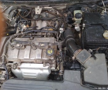 Ford Laser   2004 - Cần bán Ford Laser đời 2004, màu bạc, chính chủ