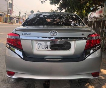 Toyota Vios 2015 - Cần bán gấp Toyota Vios năm 2015, màu bạc