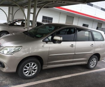 Toyota Innova 2015 - Cần bán gấp Toyota Innova năm 2015, màu vàng, giá tốt