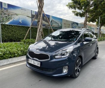 Kia Rondo 2.0 AT 2016 - Cần bán Kia Rondo 2.0 AT năm sản xuất 2016, màu xanh lam, giá thương lượng