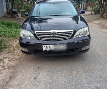 Toyota Camry 2002 - Cần bán gấp Toyota Camry sản xuất 2002, màu đen