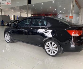 Kia Forte EX 1.6MT 2011 - Cần bán Kia Forte EX 1.6MT năm sản xuất 2011, màu đen xe gia đình, giá 355tr