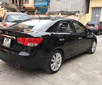 Kia Cerato 2011 - Cần bán lại xe Kia Cerato 1.6 AT đời 2011, màu đen, xe nhập