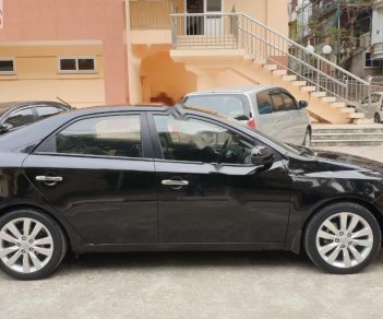 Kia Cerato 2011 - Cần bán lại xe Kia Cerato 1.6 AT đời 2011, màu đen, xe nhập