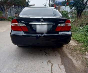 Toyota Camry 2002 - Cần bán gấp Toyota Camry sản xuất 2002, màu đen