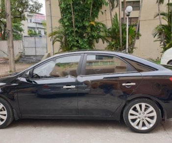 Kia Cerato 2011 - Cần bán lại xe Kia Cerato 1.6 AT đời 2011, màu đen, xe nhập