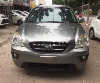 Kia Carens   2010 - Bán xe cũ Kia Carens SX 2.0 AT đời 2010, màu nâu