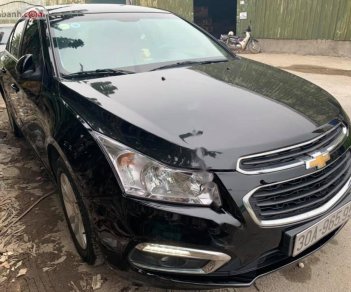 Chevrolet Cruze 2015 - Bán Chevrolet Cruze LT 1.6 MT 2015, màu đen xe gia đình