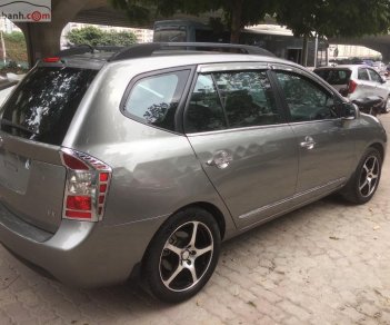 Kia Carens   2010 - Bán xe cũ Kia Carens SX 2.0 AT đời 2010, màu nâu