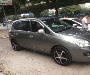 Kia Carens   2010 - Bán xe cũ Kia Carens SX 2.0 AT đời 2010, màu nâu