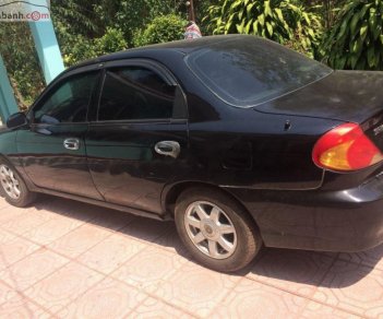 Kia Spectra   2004 - Cần bán Kia Spectra 1.6 MT đời 2004, màu đen, số sàn