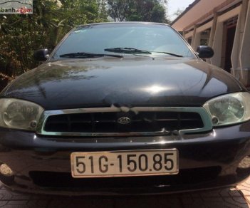 Kia Spectra   2004 - Cần bán Kia Spectra 1.6 MT đời 2004, màu đen, số sàn