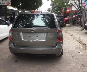 Kia Carens   2010 - Bán xe cũ Kia Carens SX 2.0 AT đời 2010, màu nâu