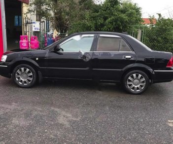 Ford Laser   2003 - Bán Ford Laser GHIA 1.8 MT sản xuất năm 2003, màu đen, 134 triệu