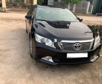 Toyota Camry     2013 - Bán xe Toyota Camry đời 2013, màu đen chính chủ, 625tr