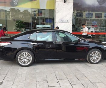 Toyota Camry   2010 - Bán xe Toyota Camry năm 2010, màu đen, xe còn mới