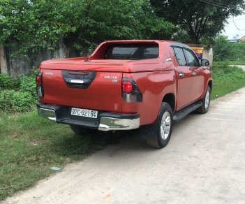 Toyota Hilux 2015 - Cần bán xe Toyota Hilux 3.0GAT đời 2015, màu đỏ, nhập khẩu, giá chỉ 605 triệu