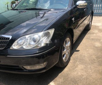 Toyota Camry   2004 - Cần bán Toyota Camry sản xuất 2004, màu đen, 330tr