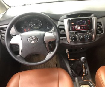 Toyota Innova 2013 - Cần bán gấp Toyota Innova sản xuất 2013, giá 390tr