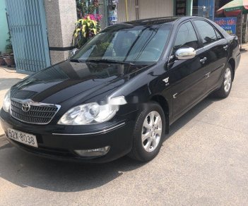 Toyota Camry   2004 - Cần bán Toyota Camry sản xuất 2004, màu đen, 330tr