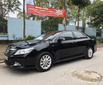 Toyota Camry  2.0E  2013 - Cần bán lại xe Toyota Camry 2.0E đời 2013, màu đen chính chủ, giá tốt