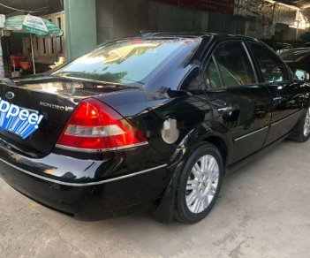 Ford Mondeo 2004 - Cần bán xe Ford Mondeo AT sản xuất 2004, màu đen