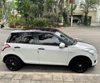 Suzuki Swift 2015 - Xe Suzuki Swift đời 2015, màu trắng xe gia đình, 410 triệu