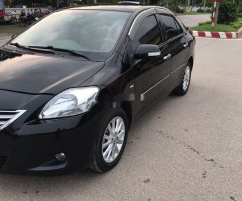 Toyota Vios  1.5 E   2012 - Bán ô tô Toyota Vios 1.5 E đời 2012, màu đen xe gia đình, 280 triệu