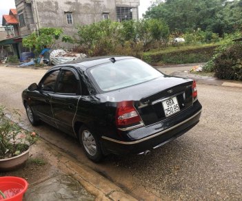 Daewoo Nubira   2003 - Bán Daewoo Nubira đời 2003, màu đen, số tự động, 75 triệu