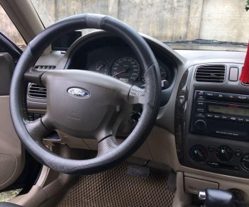 Ford Laser   2004 - Bán xe Ford Laser đời 2004, màu đen, nhập khẩu  