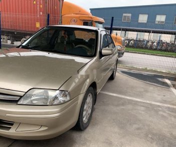 Ford Laser 2001 - Bán xe Ford Laser sản xuất năm 2001, màu vàng xe gia đình