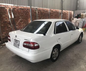 Toyota Corolla 2000 - Cần bán gấp Toyota Corolla năm 2000, màu trắng