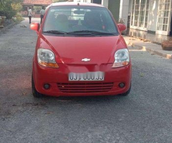 Chevrolet Spark   2013 - Bán Chevrolet Spark sản xuất năm 2013, màu đỏ, số sàn