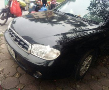 Kia Spectra 2005 - Cần bán gấp Kia Spectra năm 2005, màu đen