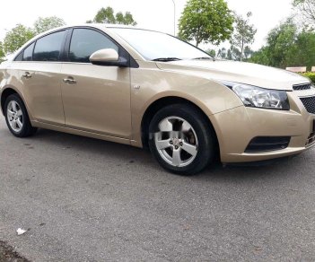 Chevrolet Cruze 2011 - Cần bán lại xe Chevrolet Cruze sản xuất năm 2011, màu vàng cát