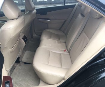 Toyota Camry 2014 - Cần bán gấp Toyota Camry 2.0E năm 2014, màu đen, 670tr