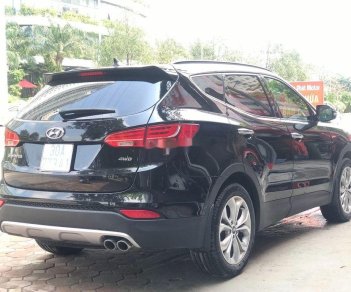 Hyundai Santa Fe 2015 - Bán ô tô Hyundai Santa Fe AWD 2.4 AT năm 2015, màu đen, 815tr