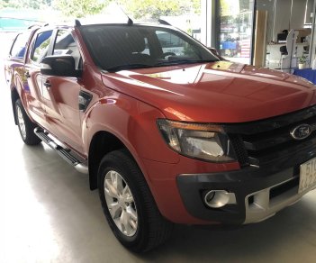 Ford Ranger Wildtrak 2.2 L 2014 - Cần bán gấp Ford Ranger Wildtrak 2.2 L sản xuất năm 2014, màu đỏ