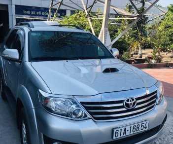 Toyota Fortuner  2.5G  2014 - Cần bán gấp Toyota Fortuner 2.5G năm sản xuất 2014, màu bạc số sàn, 695tr