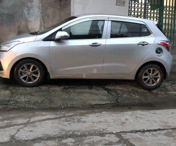 Hyundai Grand i10   2015 - Cần bán lại xe Hyundai Grand i10 2015, màu bạc, nhập khẩu 