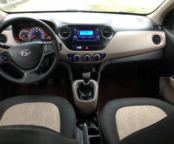 Hyundai Grand i10   2015 - Cần bán lại xe Hyundai Grand i10 2015, màu bạc, nhập khẩu 