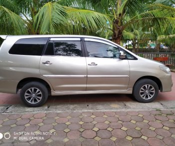 Toyota Innova 2.0E 2014 - Bán Toyota Innova 2.0E đời 2014, màu vàng, chính chủ, giá 385tr