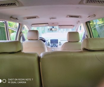 Toyota Innova 2.0E 2014 - Bán Toyota Innova 2.0E đời 2014, màu vàng, chính chủ, giá 385tr