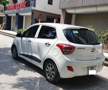 Hyundai Grand i10 AT 2015 - Xe Hyundai Grand i10 AT đời 2015, màu trắng, nhập khẩu chính hãng, còn mới