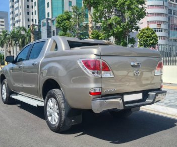 Mazda BT 50 2.2L 4x2 AT 2015 - Cần bán Mazda BT 50 2.2L 4x2 AT đời 2015, màu vàng, xe nhập