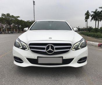 Mercedes-Benz E250 2015 - Mercedes E250 2015 màu trắng, nội thất nâu sang trọng, chủ xe bảo dưỡng định kỳ thường xuyên