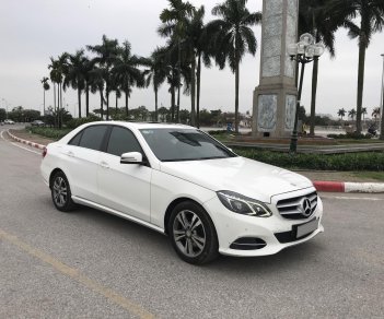 Mercedes-Benz E250 2015 - Mercedes E250 2015 màu trắng, nội thất nâu sang trọng, chủ xe bảo dưỡng định kỳ thường xuyên