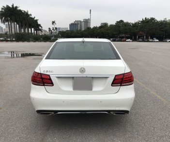 Mercedes-Benz E250 2015 - Mercedes E250 2015 màu trắng, nội thất nâu sang trọng, chủ xe bảo dưỡng định kỳ thường xuyên